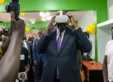 Dr. Chris Baryomunsi, Minister of ICT, explored the use of Virtual Reality during the grand opening of the AVR Cluster Centre at UICT